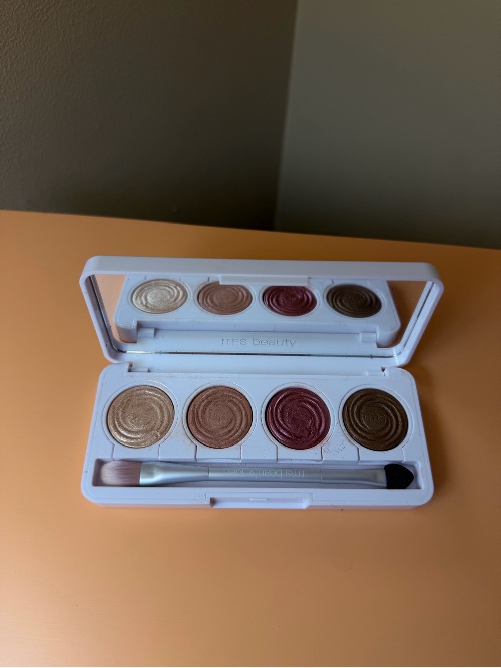 RMS Beauty quartet eyeshadow palette — gold, bronze, rose, deep brown